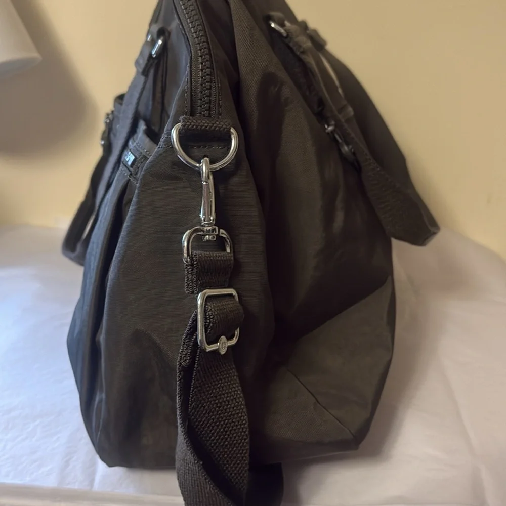 Kipling Black Duffel Bag, new, outside pockets, inside pockets, unisex